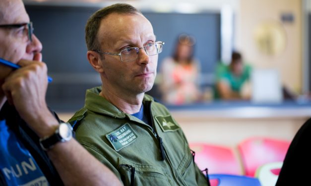 Lieutenant-Colonel Ray Stockermans watching presentation