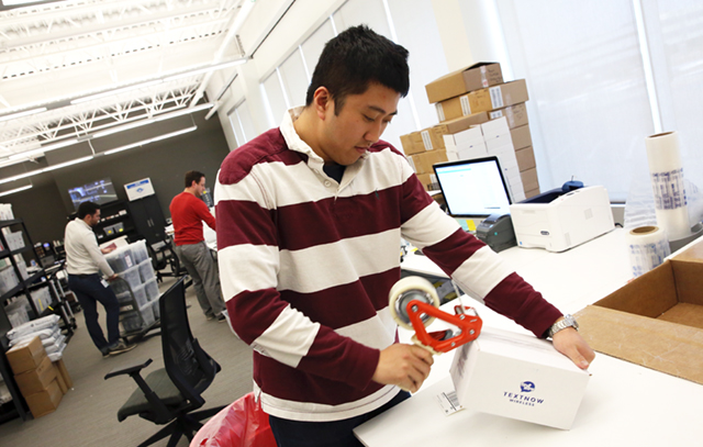 Derek Ting boxing a mobile device